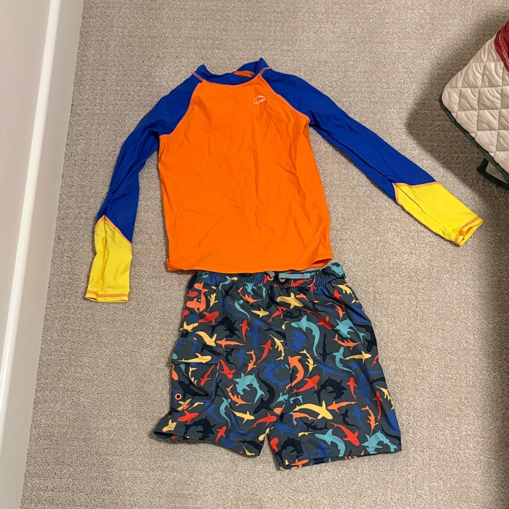 L.L. Bean swim trunks and rash guard size 6-7